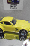 Loose Hot Wheels Yellow Nissan Fairlady Z w/Real Riders