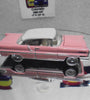 JOHNNY LIGHTNING PINK LINCOLN PREMIERE W/REAL RIDERS