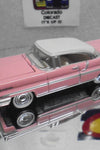 JOHNNY LIGHTNING PINK LINCOLN PREMIERE W/REAL RIDERS