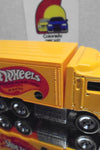 LOOSE HOT WHEELS YELLOW HIWAY HAULER W/REAL RIDERS