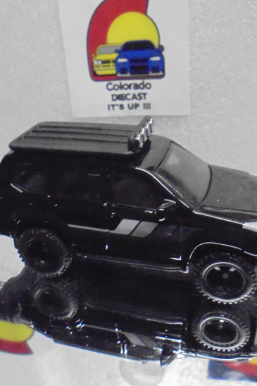 LOOSE HOT WHEELS CHASE BLACK '05 TOYOTA LAND CRUISER PRADO W/REAL RIDERS