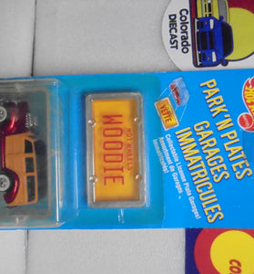 1989 HOT WHEELS PARK N PLATES RUBY RED WOODIE INTERNATIONAL CARD