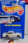 HOT WHEELS 1990 WHITE HOLDEN COMMODORE ON INTERNATIONAL BLUE CARD