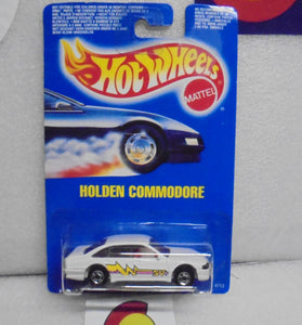 HOT WHEELS 1990 WHITE HOLDEN COMMODORE ON INTERNATIONAL BLUE CARD