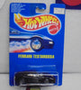 HOT WHEELS 1990 BLACK FERRARI TESTAROSSA ON INTERNATIONAL BLUE CARD