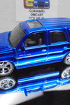 LOOSE HOT WHEELS Blue Chrome Cadillac Escalade w/Real Riders