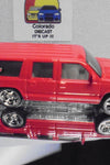 LOOSE HOT WHEELS Red Team Baurtwell Chevy Suburban w/Real Riders