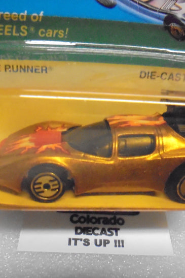 1983 HOT WHEELS ULTRA HOTS GOLD FLAME RUNNER YELLOWED BLISTER UNPUNCHED CARD