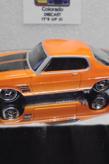 LOOSE HOT WHEELS ORANGE '73 HOLDEN MONACO GTS w/REAL RIDERS