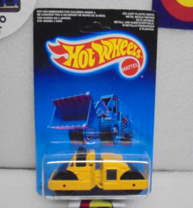 1987 HOT WHEELS YELLOW ROAD ROLLER UNPUNCHED INTERNATIONAL CARD
