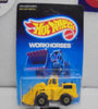 1986 HOT WHEELS WORKHORSES YELLOW CAT WHEEL LOADER UNPUNCHED CARD