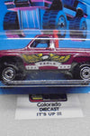 1988 HOT WHEELS TRAILBUSTERS PLUM BYWAYMAN TRUCK LEFT FACING UNPUNCHED CARD