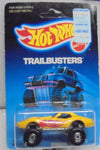 1986 HOT WHEELS TRAILBUSTERS YELLOW MONSTER VETTE w/CT WHEELS UNPUNCHED CARD