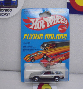 1979 HOT WHEELS FLYING COLORS SILVER OMNI 024 INTERNATIONAL CARD