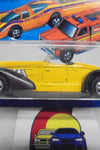 1979 HOT WHEELS FLYING COLORS YELLOW AUBURN 852 INTERNATIONAL CARD