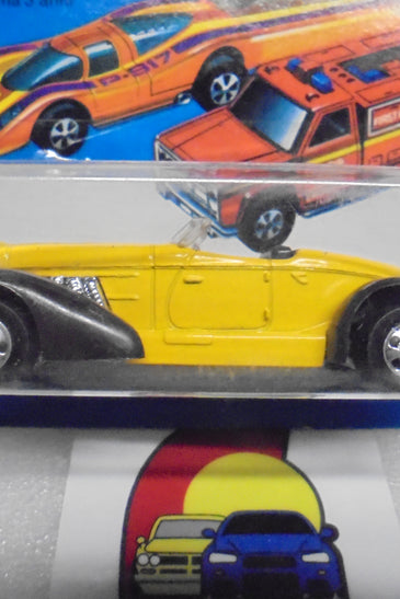 1979 HOT WHEELS FLYING COLORS YELLOW AUBURN 852 INTERNATIONAL CARD