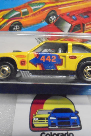 1979 HOT WHEELS FLYING COLORS YELLOW FLAT OUT 442 UNPUNCHED INTERNATIONAL CARD