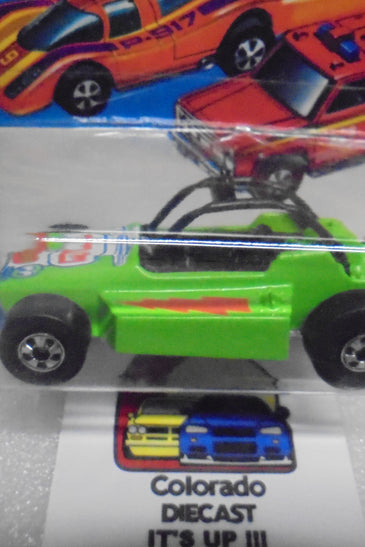 1979 HOT WHEELS FLYING COLORS GREEN ROCK BUSTER INTERNATIONAL CARD
