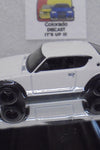 LOOSE HOT WHEELS WHITE NISSAN SKYLINE 2000 GT-R w/RR'S