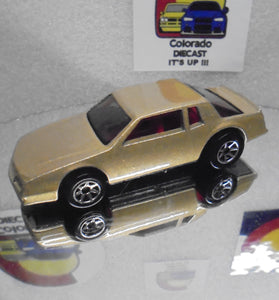 LOOSE HOT WHEELS GOLD CHEVY STOCKER w/RED INTERIOR & 7 SPOKE WHEELS