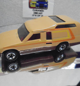 Loose Hot Wheels Tan Mini Trek Van w/Blackwalls