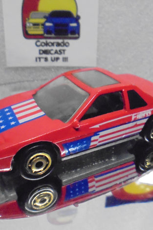 Loose Hot Wheels Red Pontiac Fiero w/GHO's  Flag on Hood