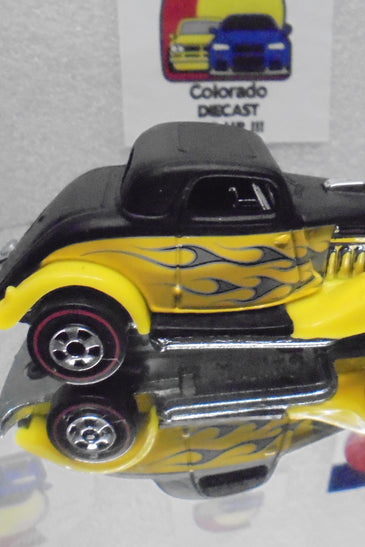 LOOSE HOT WHEELS BLACK/YELLOW w/FLAMES 3-WINDOW '34 FORD w/REDLINES