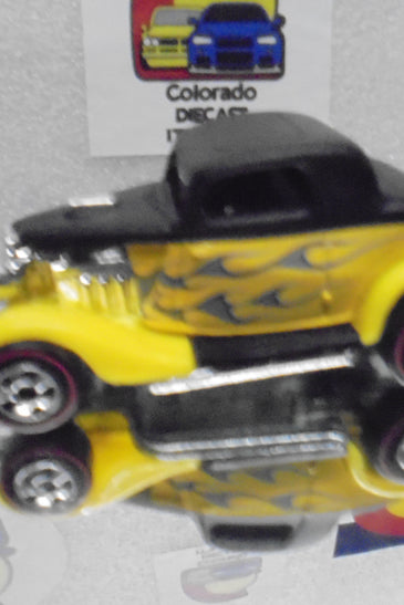 LOOSE HOT WHEELS BLACK/YELLOW w/FLAMES 3-WINDOW '34 FORD w/REDLINES