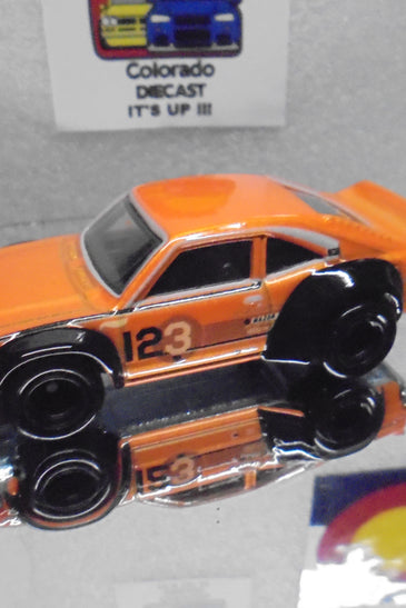 LOOSE HOT WHEELS ORANGE MAZDA RX-3 w/REAL RIDER'S