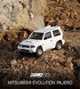 INNO64 1:64 Mitsubishi Pajero Evolution (White) with Extra Wheels